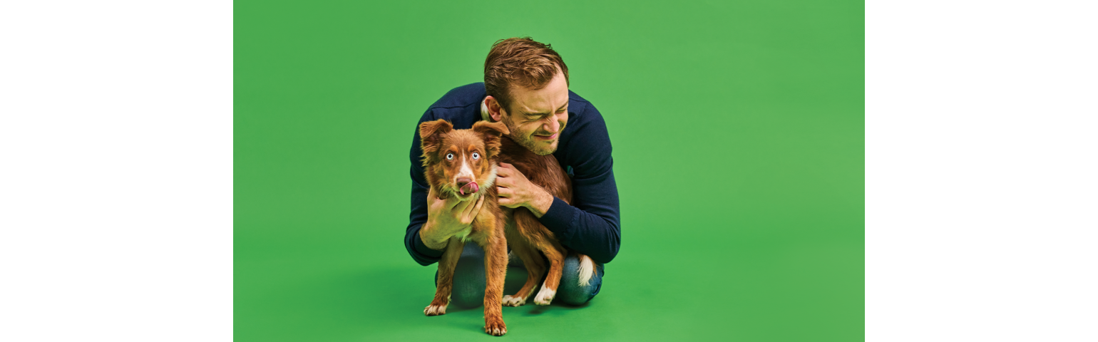 picture of Rory the vet playing with a dog