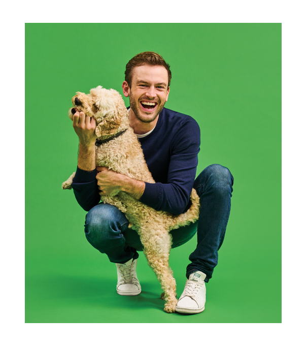 picture of Rory the vet playing with a dog