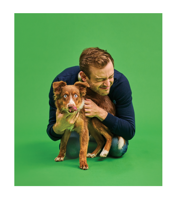 picture of Rory the vet playing with a dog